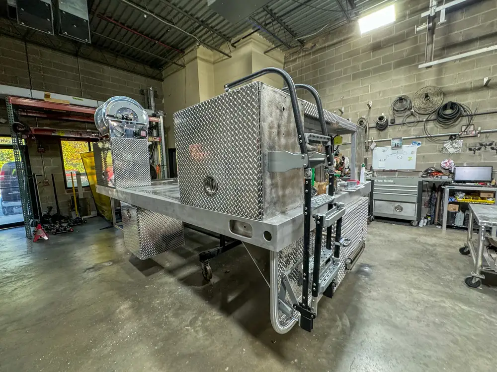 Engine and hose connection hardware detail, photo 179 of 303.